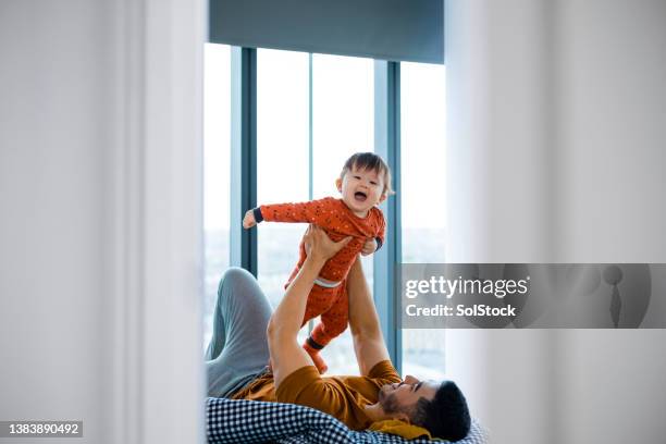 play time with my baby boy - babyhood stock pictures, royalty-free photos & images