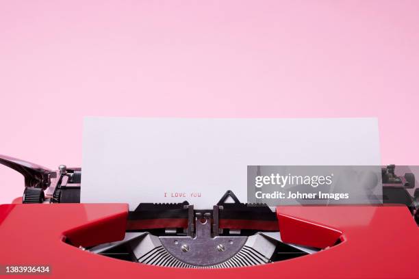 love message typed on vintage typewriter - love letter stock pictures, royalty-free photos & images