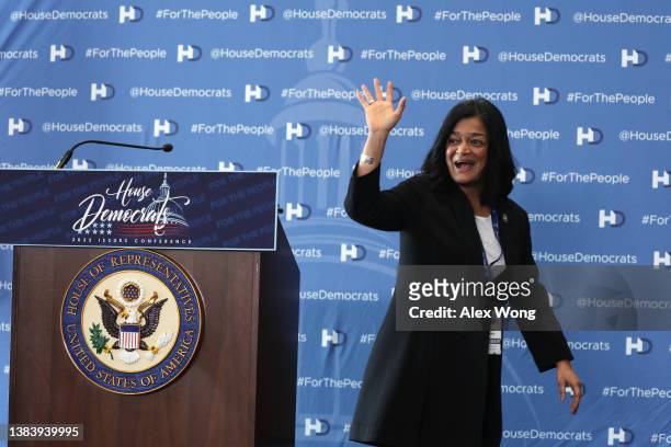 Rep. Pramila Jayapal , Chair of Congressional Progressive Caucus , waves after she spoke at a news briefing at the 2022 House Democratic Caucus...
