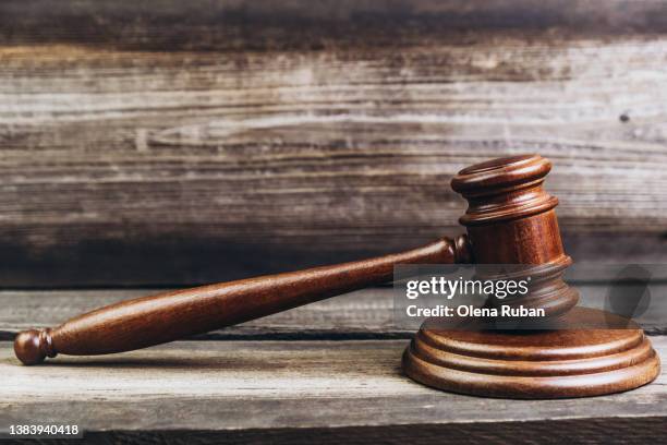 gavel and sound block on planks. - legislation stockfoto's en -beelden