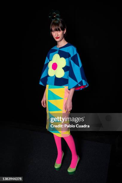 Model prepares backstage prior to the catwalk of XXXXX during Mercedes Benz Fashion Week Madrid March 2022 at Ifema on March 10, 2022 in Madrid,...