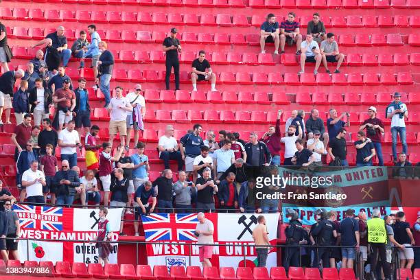 Fans of West Ham United enjoy the pre match atmosphere prior to the UEFA Europa League Round of 16 Leg One match between Sevilla FC and West Ham...