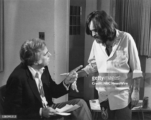 Episode 28 -- Air Date 06/12/81 -- Pictured: Host Tom Snyder in an exclusive interview with convicted mass murderer Charles Manson, currently serving...