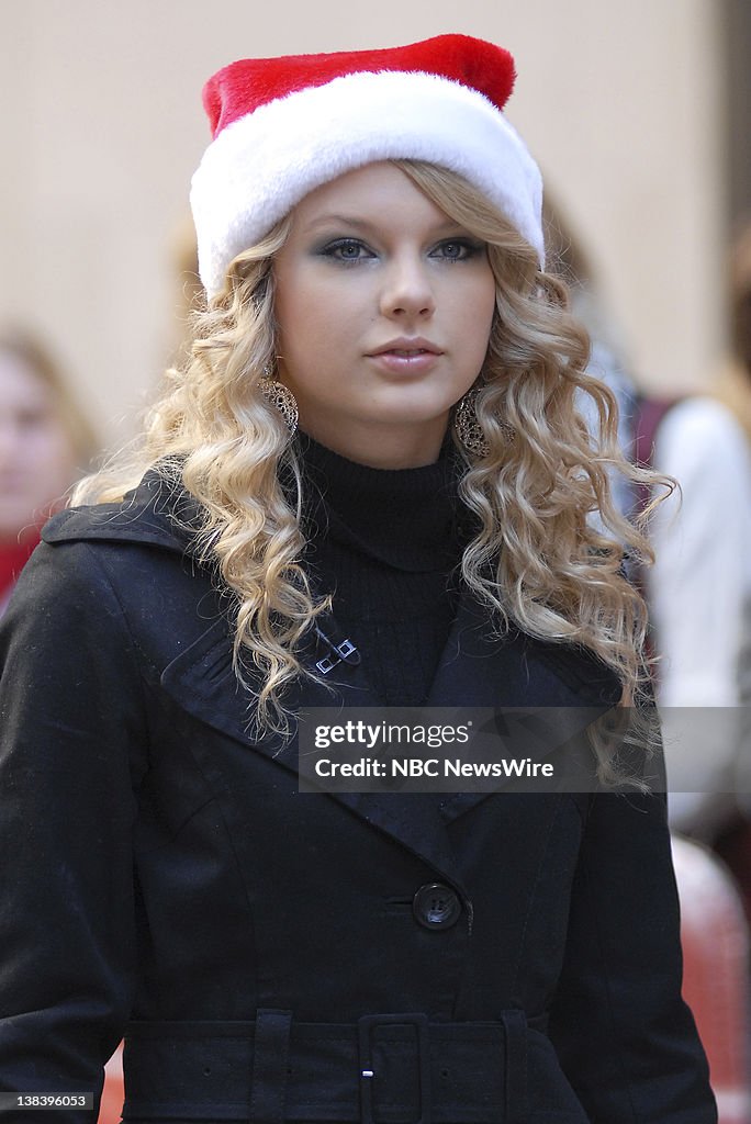 Country western singer Taylor Swift collects toys for charities on
