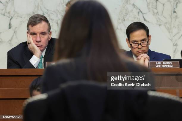 Chairman Sen. Mark Warner and Vice Chairman Sen. Marco Rubio listen to testimony from Director of National Intelligence Avril Haines during a Senate...