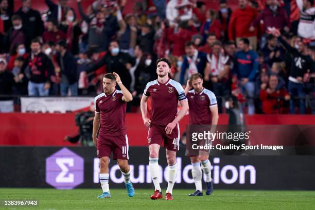 Players of West Ham United react during the UEFA Europa League Round of 16 Leg One match between Sevilla FC and West Ham United at Estadio Ramon...