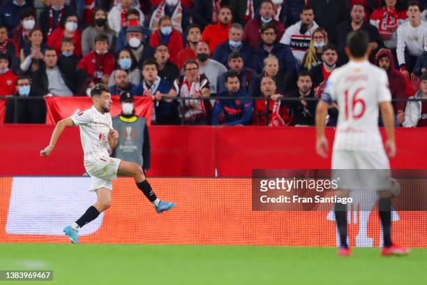 Munir El Haddadi of Sevilla FC scores their team's first goal during the UEFA Europa League Round of 16 Leg One match between Sevilla FC and West Ham...