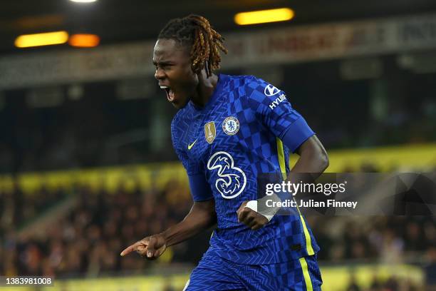 Trevoh Chalobah celebrates with Thiago Silva of Chelsea after scoring their team's first goal during the Premier League match between Norwich City...