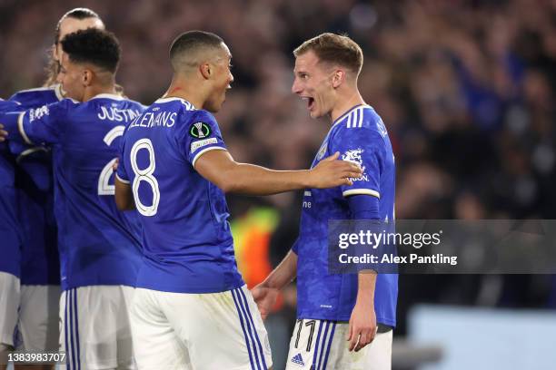 Marc Albrighton celebrates with Youri Tielemans of Leicester City after scoring their team's first goal during the UEFA Conference League Round of 16...