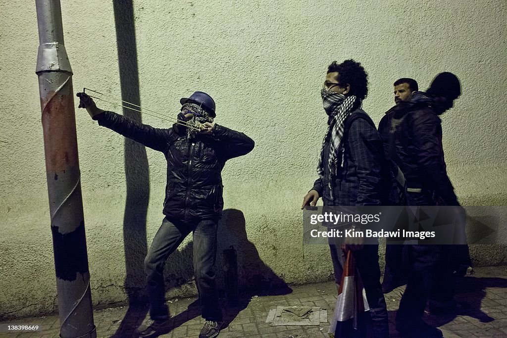 Egyptian protesters engage in street fights with Egyptian Security Council Armed Forces (SCAF)