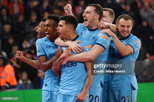 Bruno Guimaraes of Newcastle United celebrates scoring their sides second goal of the game with teammates during the Premier League match between...