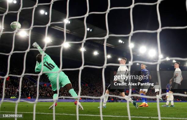 Marc Albrighton of Leicester City scores their team's first goal past Alfred Gomis of Rennes during the UEFA Conference League Round of 16 Leg One...