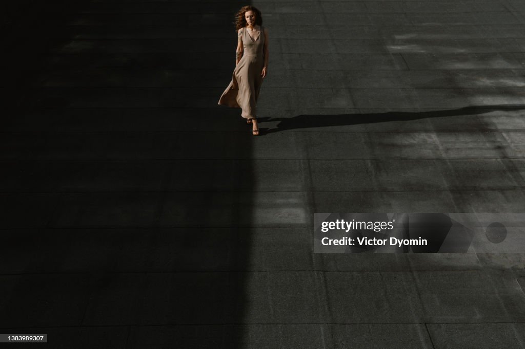 Gorgeous young woman in the bright sunset light