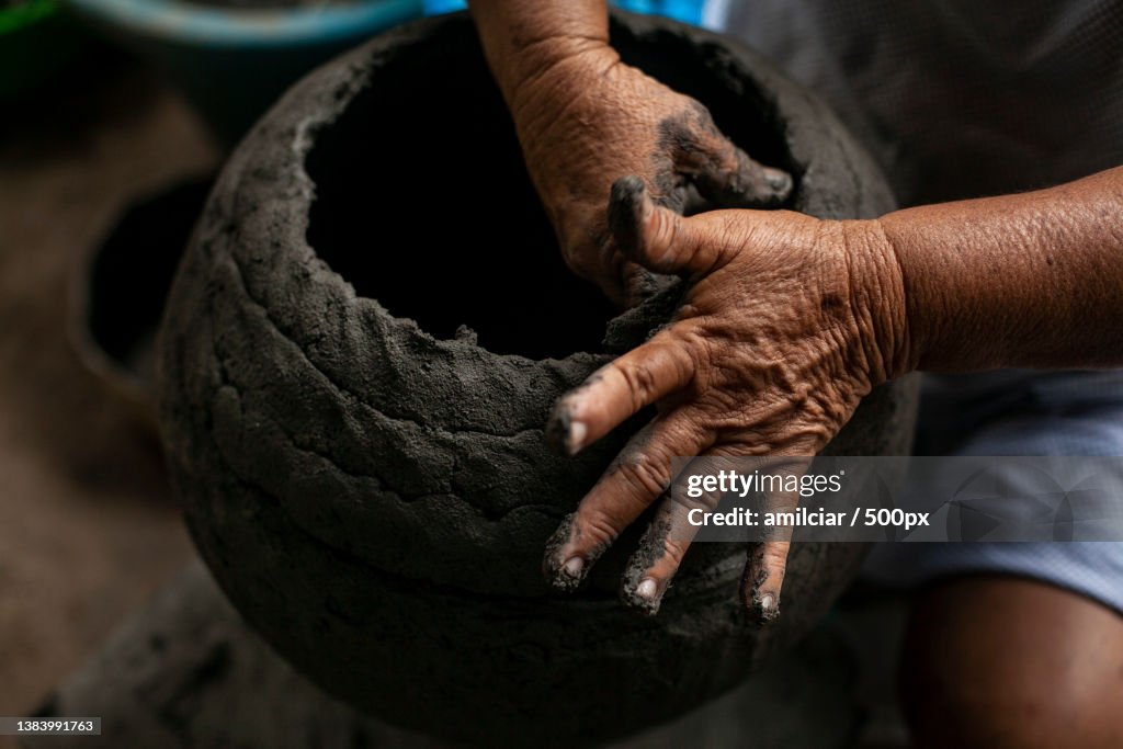 Hands of women craftsmen making clay vessels,Manicuare,Sucre,Venezuela