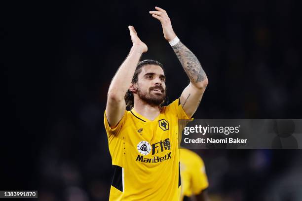 Ruben Neves of Wolverhampton Wanderers applauds the fans after celebrating scoring their sides fourth goal of the game during the Premier League...