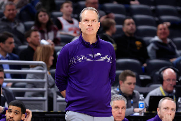 Head coach Chris Collins of the Northwestern Wildcats looks on during the second half in the game against the Iowa Hawkeyes during the Big Ten...