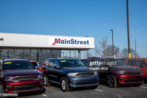 Lansing, Kansas. Car dealership lot displaying new 2021 Dodge vehicles on the lot.