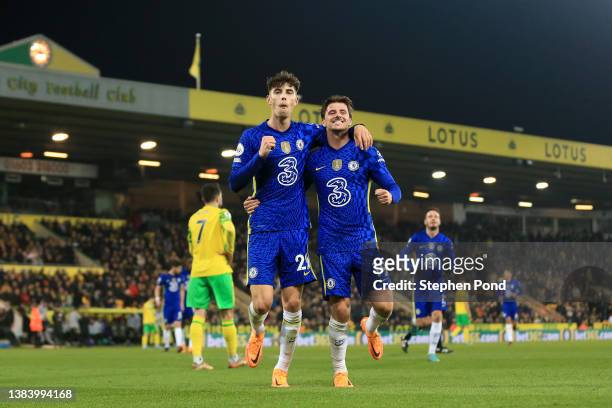 Kai Havertz celebrates with Mason Mount of Chelsea after scoring their team's third goal during the Premier League match between Norwich City and...