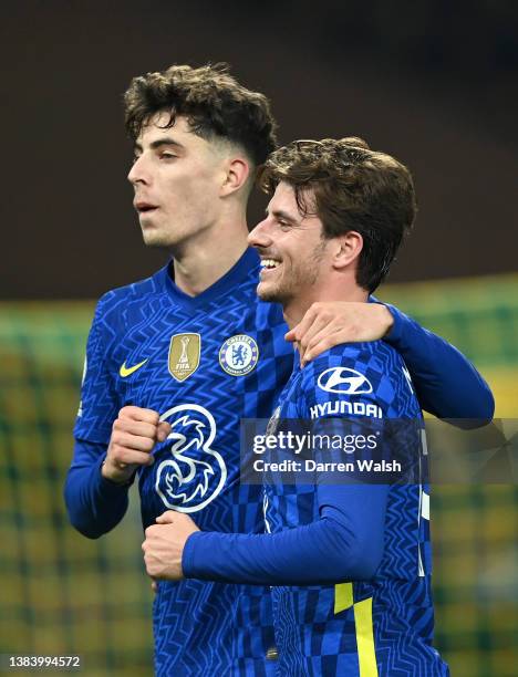 Kai Havertz celebrates with Mason Mount of Chelsea after scoring their team's third goal during the Premier League match between Norwich City and...