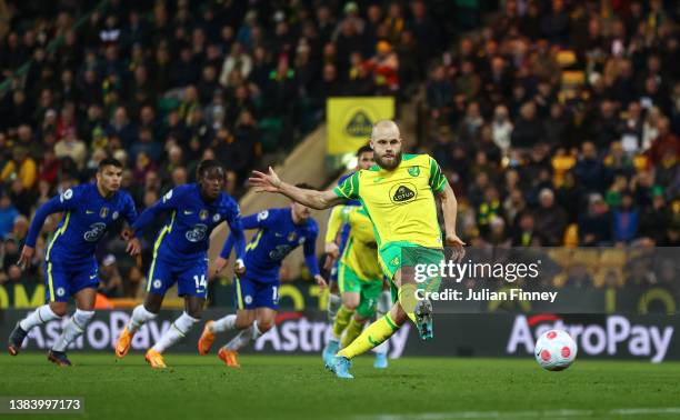 Teemu Pukki of Norwich City scores their team's first goal from the penalty spot during the Premier League match between Norwich City and Chelsea at...