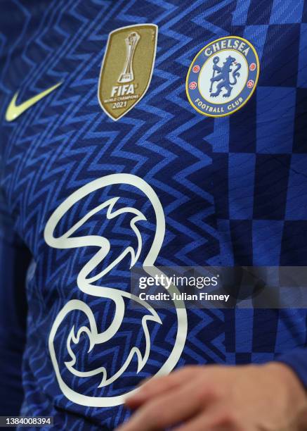 Detailed view of the Three logo is seen on the shirt of a Chelsea player during the Premier League match between Norwich City and Chelsea at Carrow...