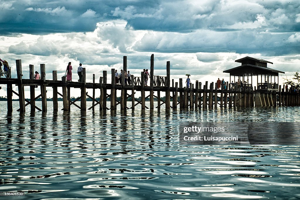 People walking on U Bein's Bridge