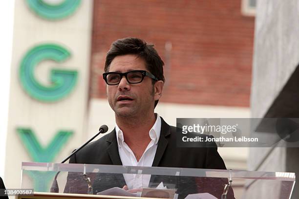 John Stamos attends the musical group America honored on the Hollywood Walk of Fame Induction Ceremony on February 6, 2012 in Hollywood, California.