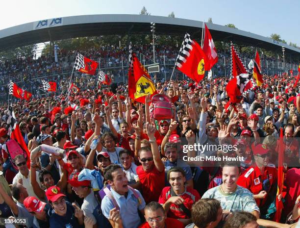 Ferrari fans invade the track after a 1-2 during the FIA Formula One Italian Grand Prix at the Autodromo di Monza, Italy on September 15, 2002.