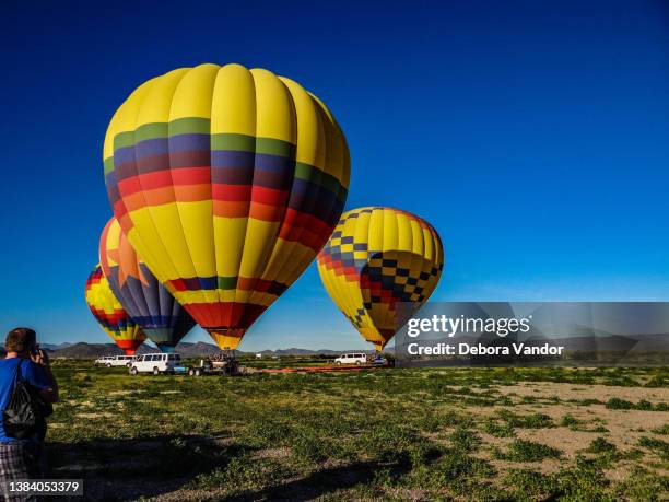 hot air balloons awaiting departure in arizona - scottsdale arizona stock pictures, royalty-free photos & images