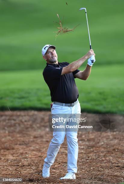 Lee Westwood of England plays his second shot on the par 4, 12th hole during the first round of THE PLAYERS Championship at TPC Sawgrass on March 10,...