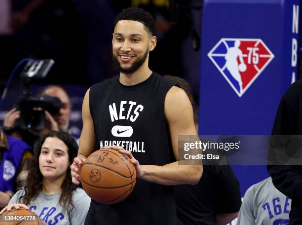 Ben Simmons of the Brooklyn Nets warms up before the game against the Philadelphia 76ers at Wells Fargo Center on March 10, 2022 in Philadelphia,...