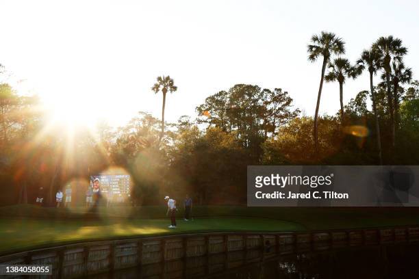 Brandon Hagy of the United States watches his putt on the fourth green during the first round of THE PLAYERS Championship on the Stadium Course at...