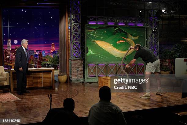 Episode 3755 -- Air Date -- Pictured: Host Jay Leno, reptile expert Jules Sylvester with the deadly Black Mamba snake on May 1, 2009