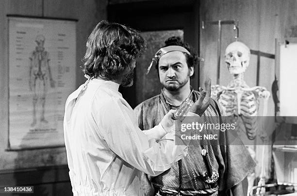 Episode 24 -- Air Date -- Pictured: Kris Kristofferson as himself and John Belushi as Samurai Futaba during the Samurai General Practitioner" skit on...