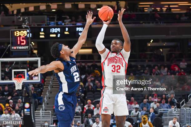 Liddell of the Ohio State Buckeyes attempts a shot over Jalen Pickett of the Penn State Nittany Lions during the second half of a Men's Big Ten...