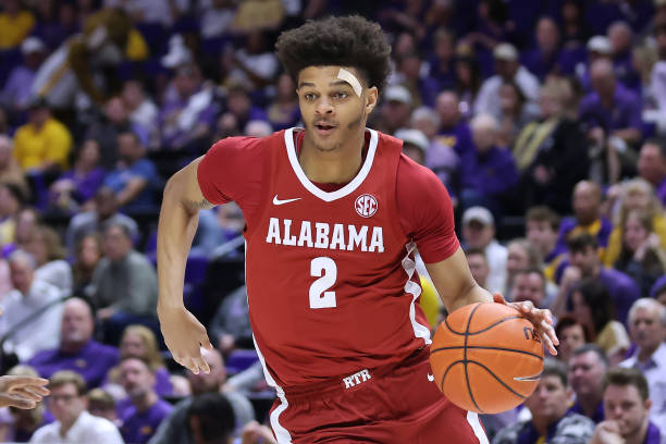 Darius Miles of the Alabama Crimson Tide drives with the ball against the LSU Tigers during a game at the Pete Maravich Assembly Center on March 05,...