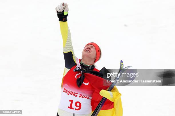 Bronze medallist Andrea Rothfuss of Team Germany reacts after competing in the Women's Giant Slalom Standing during day seven of the Beijing 2022...