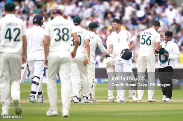 England's James Anderson shake hands with Australia's Alex Carey following day five of the second Ashes test match at Lord's, London. Picture date:...