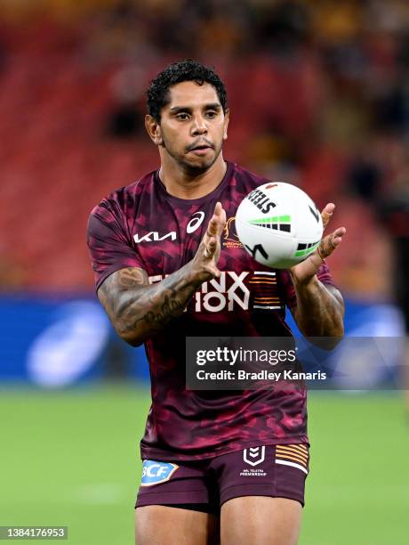 Albert Kelly of the Broncos catches the ball during the warm-up before the round one NRL match between the Brisbane Broncos and the South Sydney...