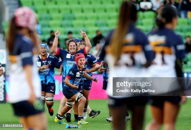 Melanie Kawa of the Rebels and team mates celebrate victory at full time during the round two Super W match between the Melbourne Rebels and the ACT...