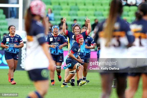 Melanie Kawa of the Rebels and team mates celebrate victory at full time during the round two Super W match between the Melbourne Rebels and the ACT...
