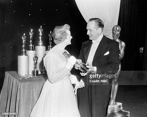 Ceremony -- AIr Date -- Pictured: Best Actress winner Shirley Booth for "Come Back, Little Sheba", host/presenter/actor Fredric March at the 25th...