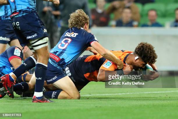 Rob Valetini of the Brumbies scores a try during the round four Super Rugby Pacific match between the Melbourne Rebels and the ACT Brumbies at AAMI...
