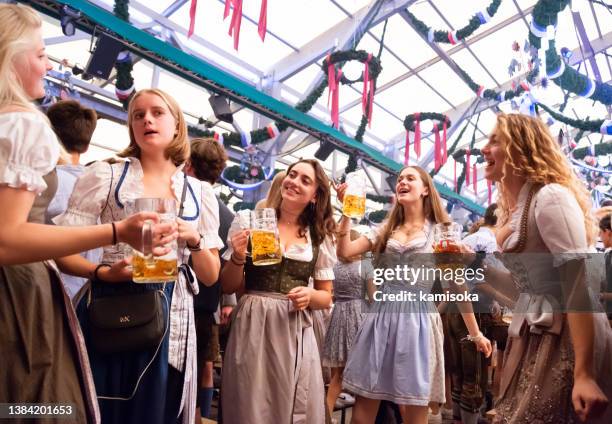 beer tent, octoberfest in munich, germany - oktoberfest germany stock pictures, royalty-free photos & images