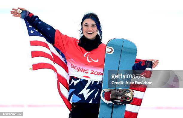 Brenna Huckaby of Team United States reacts after winning gold in the Women's Banked Slalom SB-LL2 during day seven of the Beijing 2022 Winter...