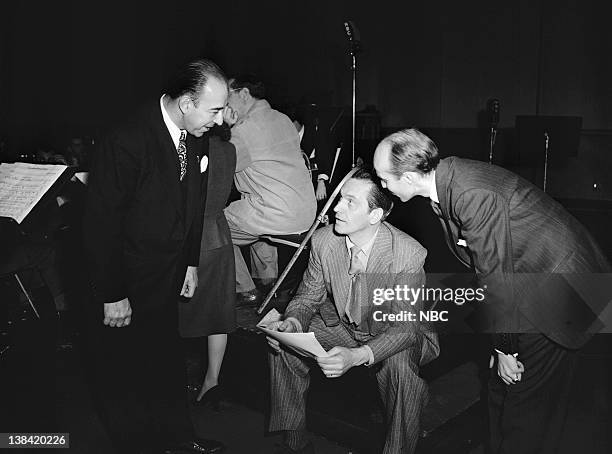 Salute to War Workers" -- Pictured: Joe Collucci, host Fredric March, Wendell Gibbs of the War Manppower Commission during a War Manpower Commission...