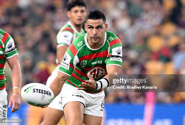 Cody Walker of the Rabbitohs passes the ball during the round one NRL match between the Brisbane Broncos and the South Sydney Rabbitohs at Suncorp...