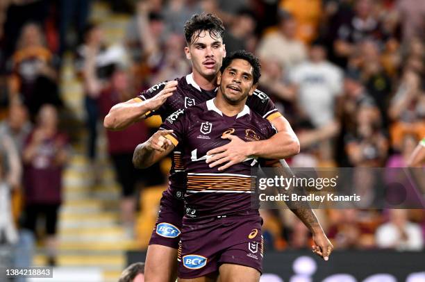 Albert Kelly of the Broncos celebrates scoring a try during the round one NRL match between the Brisbane Broncos and the South Sydney Rabbitohs at...