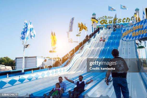 people at oktoberfest in munich, germany - biergarten münchen stock pictures, royalty-free photos & images