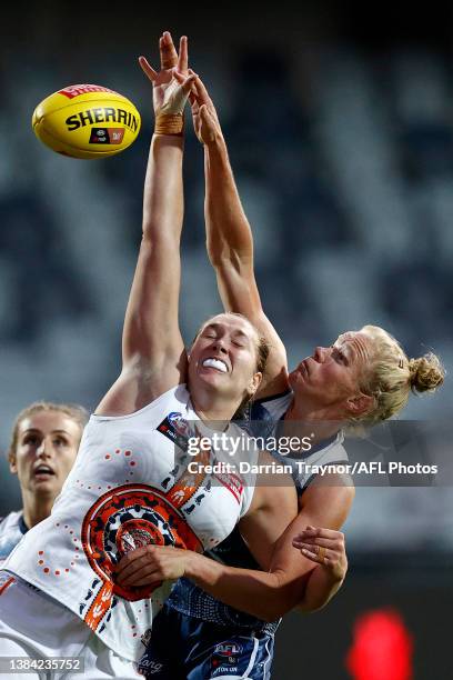 Erin McKinnon of the Giants wins a hit out during the round 10 AFLW match between the Geelong Cats and the Greater Western Sydney Giants at GMHBA...